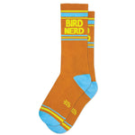 A pair of orange gym crew socks with blue stripes and 'BIRDNERD' text, featuring a bird silhouette design.