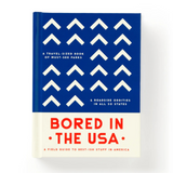 Book titled 'Bored in the USA' with blue and white cover design on a white background