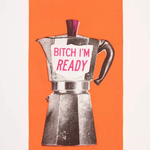 Close up of Blue Q's dish towel. Bright orange with a screen-printed Moka Pot. A pink accent on the lid as well as pink writing on the side of the pot that reads "Bitch I'm ready" 