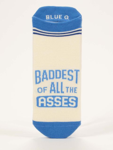 Blue Q Sneaker Socks. Cream sock with a blue toe and accent around ankle. In blue text on the top of the foot it reads "Baddest of all asses."