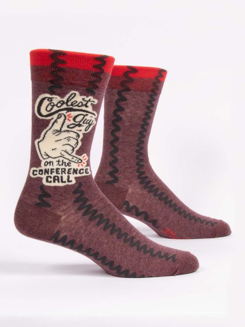 Blue Q crew socks. maroon with a red stripe at the top. An illustration of a hand giving the shaka symbol is in the middle of the words "Coolest guy in the conference call"
