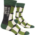 Blue Q crew socks. Grey, green and white geometric pattern. Down the side it reads "This meeting is bullshit"