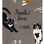 Blue Q dish towel. Grey background with a variety of orange, black and white cats all over. In the middle the words "People I love: Cats"